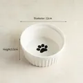 White ceramic cat bowl with paw print pattern and vertical relief lines, 12cm diameter - Single White Bowl (Paw Print)