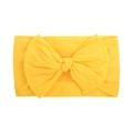 Soft yellow baby nylon headband with large bow detail on a plain white background - Yellow (004)
