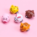 Set of 5 cartoon animal toy cars including pig, tiger and monkey on pink background - 5 Styles Animal Pull Back Cars
