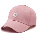Pink cotton baseball cap featuring white 3D letter M embroidery and curved brim - Adjustable / Pink