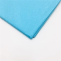 Stack of blue tissue paper for flower wrapping with minimalist gold pattern finish - Lake Blue