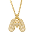 Macro shot of bubble-style letter M pendant in gold plating with pavé zircon setting - Letter M