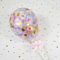 Five-inch clear birthday cake balloon filled with colorful round confetti and a pink bow - Round / Colorful Confetti