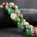 Polished 10mm round beads with natural green and reddish-brown agate stone texture - Patterned One