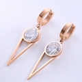Detail view of rose gold geometric triangle earrings with sparkling round zircon stone - Rose Gold Triangle Large Stone Style (Style 7)