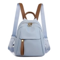 Stylish light blue nylon backpack with brown leather straps and gold hardware details - Light Blue