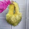 Detail of bright yellow faux fur handbag showing long plush texture and soft carry handle - Small / Yellow
