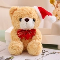 Detailed view of brown teddy bear with red Christmas hat and Merry Christmas bow - Red Bow Tie Style (Light Brown Bear)