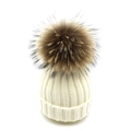 Detail of cream knit beanie with fluffy brown faux fur pom pom and warm ribbed texture - Lined Adult Style / White