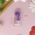 Macro detail of purple question mark birthday candle showing 4.1cm height and 2.2cm width - Boxed-Small / Purple