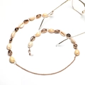Chic eyewear chain with cream seashells and gold metal links on a clean white background - Gold