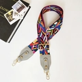 Close-up of adjustable ethnic style bag strap with colorful weave and gold metal hooks - Rainbow Gray Leather