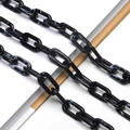 Close-up of black marble pattern acrylic chain links with glossy finish and white veins - No.1 (Black & White Marble)