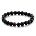 Elastic beaded bracelet with black lava rock and a brown tiger eye stone accent - Volcanic Stone + Tiger Eye