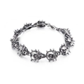 Pulsera punk para hombre de acero inoxidable con calaveras talladas y cierre de langosta - Estilo De Calavera Con Puntas De Espina (KB122861-BDJX)