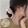 Elegant gold twisted hoop earrings for women with a French vintage minimalist style - Gold Twisted Hoop