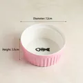 Hanging pink ceramic cat bowl with fishbone pattern and vertical relief texture - Single Pink Bowl (Fish Bone)
