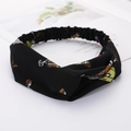 Cross knot elastic headband in black fabric with character print for women - Black Santa Claus