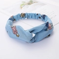 Blue twisted headband with cartoon character print for women on white background - Blue Characters