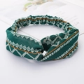 Cross knot green fabric headband featuring elegant white and gold geometric patterns - Style 91 Green Geometric