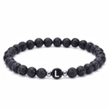 6mm natural lava stone bracelet featuring a personalized letter L bead with silver spacers - L