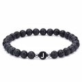 Macro view of 6mm black lava stone beads and letter J charm on elastic bracelet - Letter J