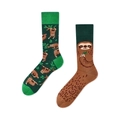 Asymmetrical crew socks with creative green and brown sloth patterns in a flat lay view - Sloth