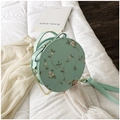 Mint green round crossbody bag with white floral embroidery and gold chain strap - Round / Green