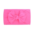 Pink nylon baby headband featuring a large soft bow with high elasticity and comfort - Peach Pink (017)
