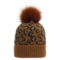 Detail view of the thick leopard jacquard knit pattern and fluffy brown faux fur pompom - Rust red