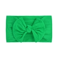 Soft emerald green nylon baby headband with a large handmade bow decoration - Emerald Green (012)