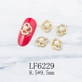 Detail of gold hollow flower nail art charm with white pearl and colorful rhinestones - Gold Flower Pearl Center Aurora AB Rhinestone (6229)