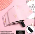 Pink automatic folding umbrella with gold heart patterns and black sun-proof coating - Automatic / Heartbeat Pink