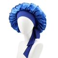 Detail of blue satin sleep cap featuring a wide adjustable tie band on a model - Royal Blue