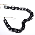 Schwarze Brillenkette aus Acryl mit rechteckigen Gliedern und Hochglanz-Finish auf Weiß - Rechteckige Kette / Schwarz