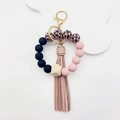 Llavero de pulsera de silicona con cuentas de leopardo, madera y borla rosa - Leopardo Rosa