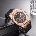 Close-up of men's chronograph watch with rose gold octagonal case and black rubber strap - Rose Gold Case Black Dial(7)