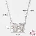 Sterling silver boy and girl pendant necklace with cubic zirconia crystals - Js22-jn3029 / One Size
