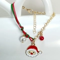 Detail of Christmas bracelet featuring Santa Claus charm, red and green braided rope, and beads - Santa Head Style (HLBX2025-老人头)