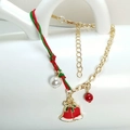 Detailed shot of Christmas bracelet with red and green braided rope, pearls and bells - Bell Style (HLBX2025-铃铛)