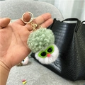 Detail of cute cauliflower plush keychain with green sunglasses and golden metal clasp - Single OPP Bag Packaging / Gray