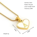Detail view of heart necklace pendant showing dimensions 13mm by 16mm in 18K gold plated steel - Letter A
