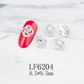 Macro detail of alloy flower nail art studs with AB crystals and pearls 8.5x9.5mm - Silver Flower Aurora AB Rhinestone Style (6204)