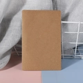 Vertical view of minimalist brown kraft paper blank notebook with professional layout - Kraft Card - Blank
