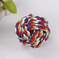 Close-up of a colorful braided cotton rope ball toy for dog teeth cleaning and chewing - 7cm 85g / Colorful