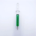 Syringe shaped ballpoint pen with green liquid and visible measurement markings - 0.7mm Black Ink / Green Barrel / Black
