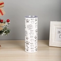 Detail of 20oz white insulated travel mug with cute cartoon dog paws and bone patterns - Dog Paw and Bones