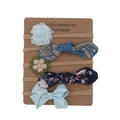 Detail showing five-piece set of nylon baby headbands with floral and bow designs on card - Light Blue Ribbed Style
