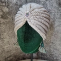 Beige knitted turban hat with vintage silver brooch and colorful gemstones for winter - Rhinestone Style / Milky White