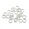 Scattered set of 925 sterling silver open jump rings for DIY jewelry making and crafts - 0.6x5mm Single Loop
